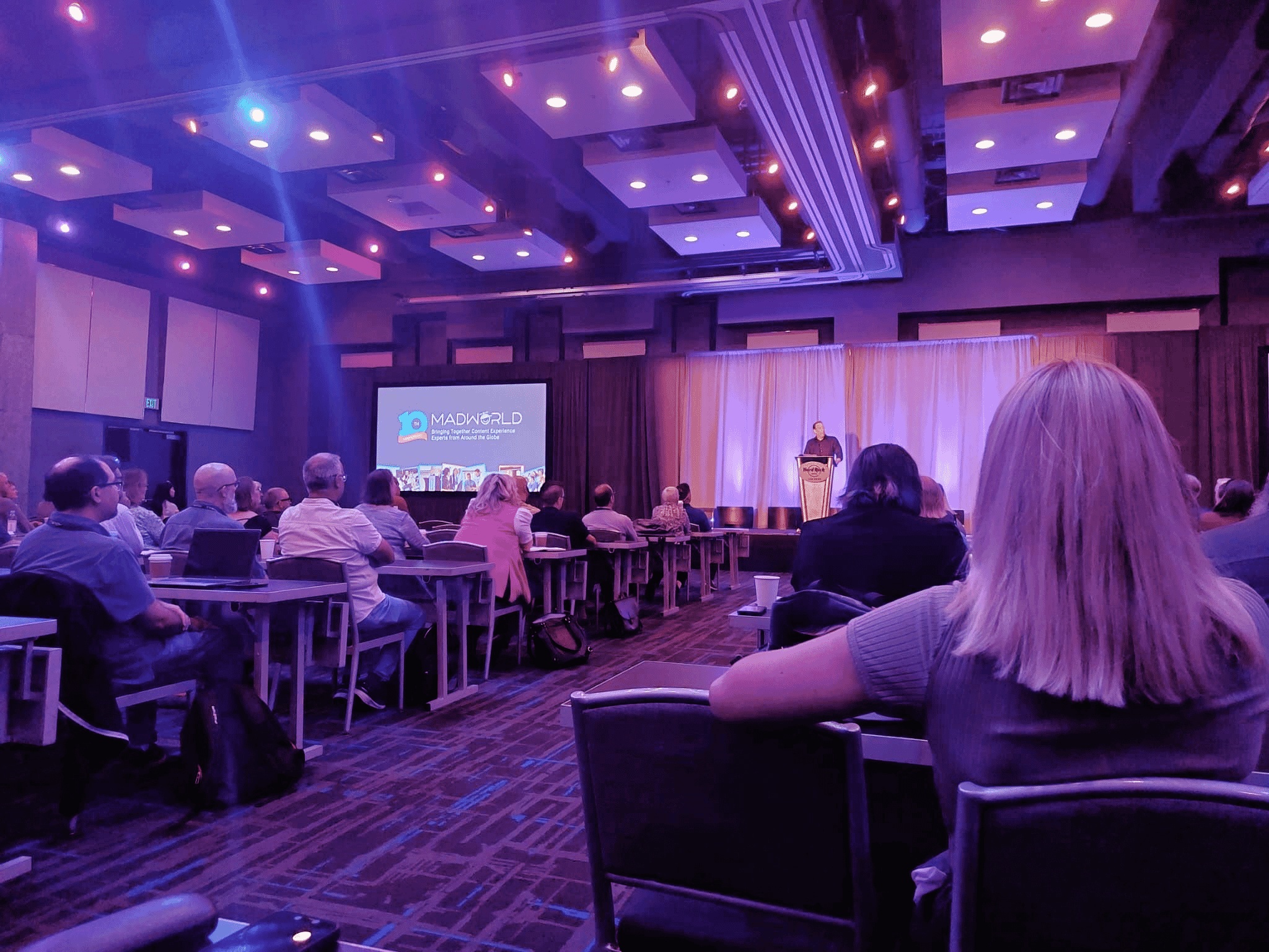 Anthony Olivier addressing attendees from the stage at MadWorld San Diego 2023
