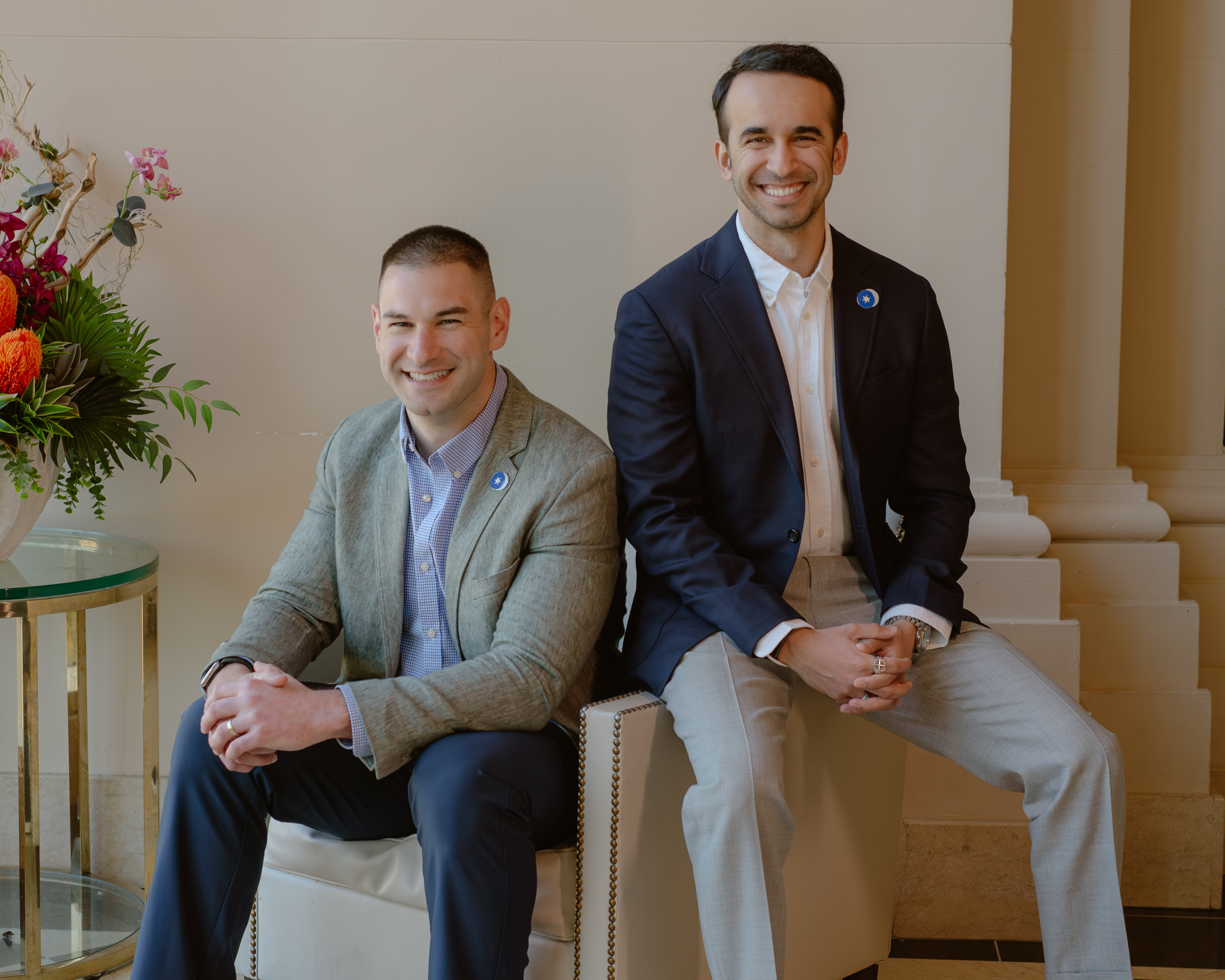 Anthony Rotio, left, and GrowthLoop co-CEO Tameem Iftikhar, right, seated together