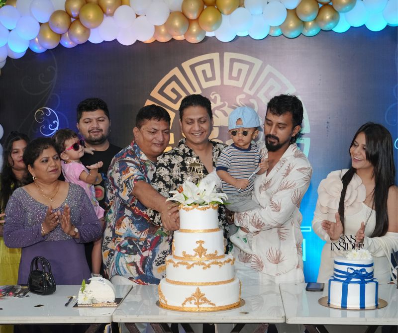 Anuj Pakhare at Vereigen Media’s seventh-anniversary cake-cutting celebration with other attendees