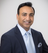 Anupam Sarwaikar in a suit, in the photograph accompanying his Indian Angel Network biography