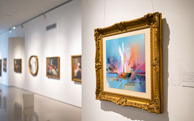 Tru Vue product application photograph showing framed paintings in a gallery
