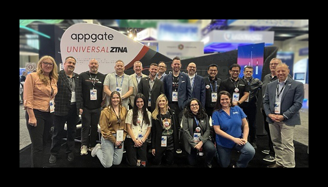 Appgate employees gathered at a Universal ZTNA conference booth