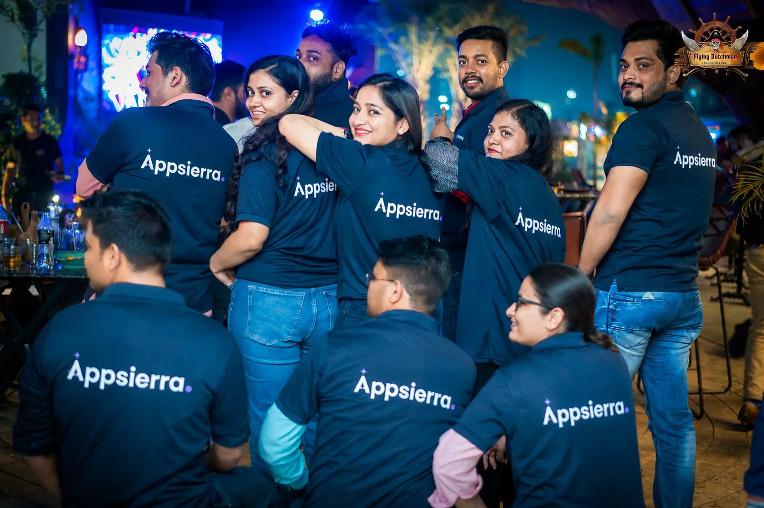 AppSierra team members in company shirts at a team event in India