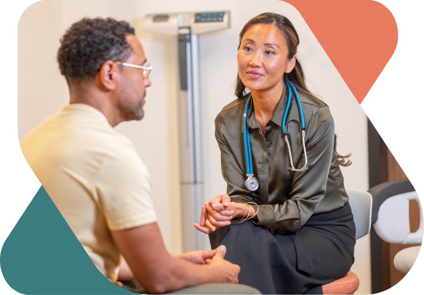 A Vera Whole Health provider sits facing a patient during a consultation