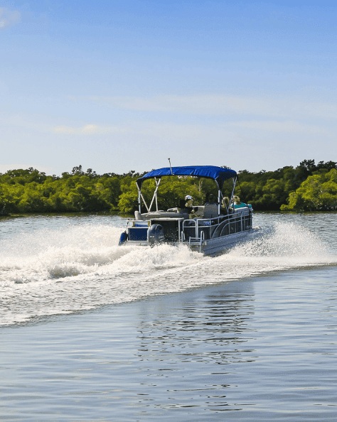 People enjoying a ride on a pontoon boat