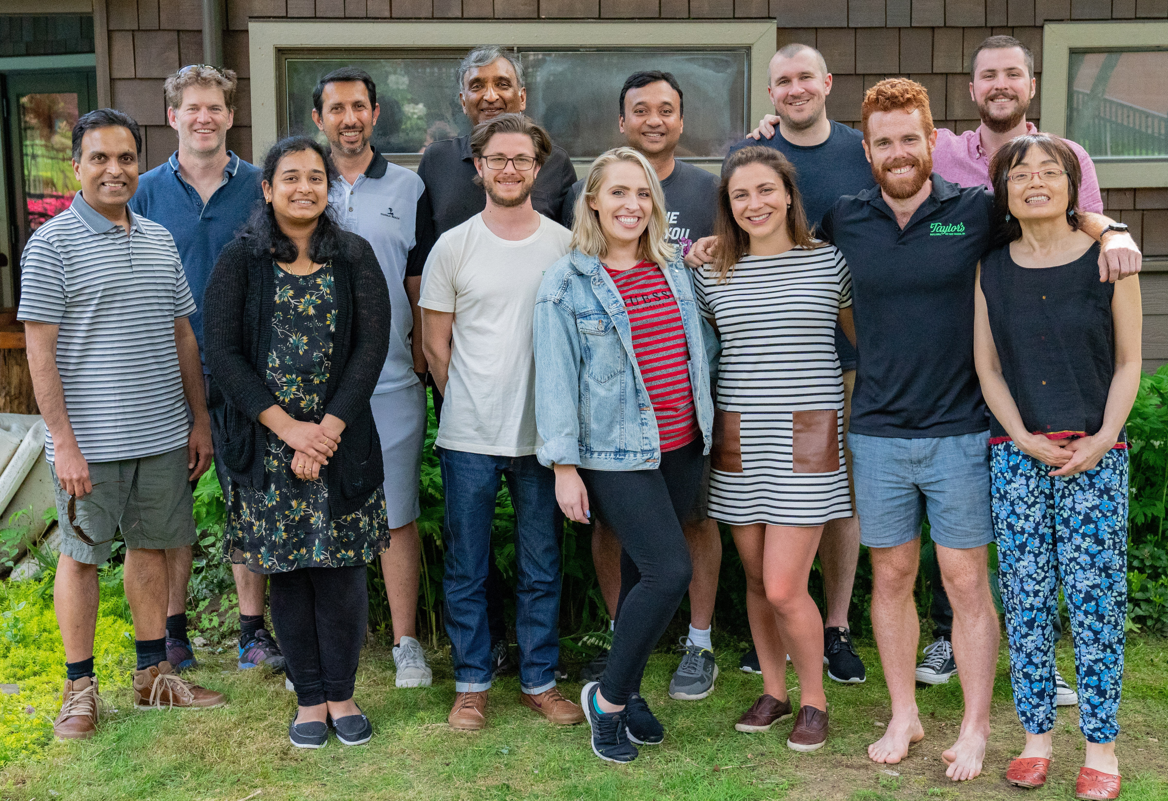 An early SeekOut team gathered outdoors, with Aravind Bala standing in the back row near the center