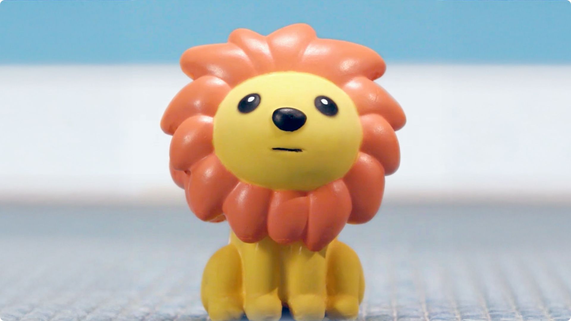 Yellow lion dog toy used as a character in Virbac’s dental-chew campaign