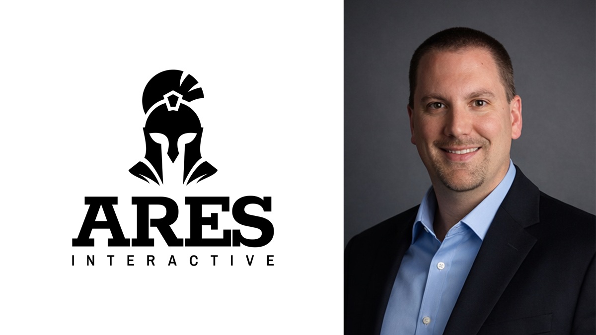 Ares Interactive president and CEO Mike DeLaet seated in front of Ares artwork
