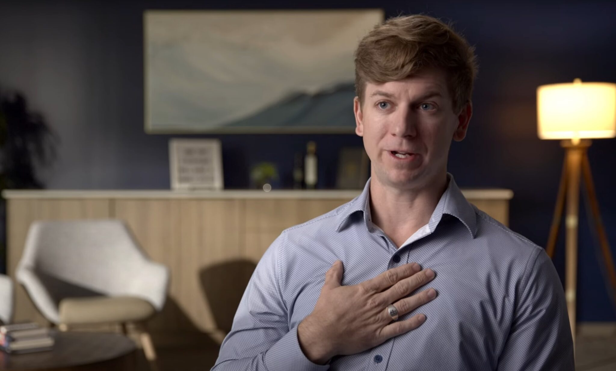 An Ark Financial team member speaking in an office