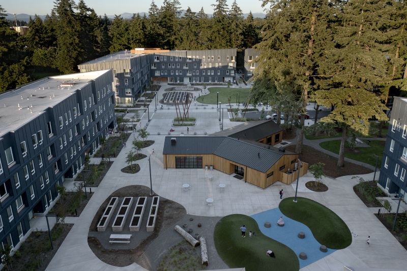 Housing buildings and a courtyard at the Rockwood 10 project shown in LMC Construction’s case study