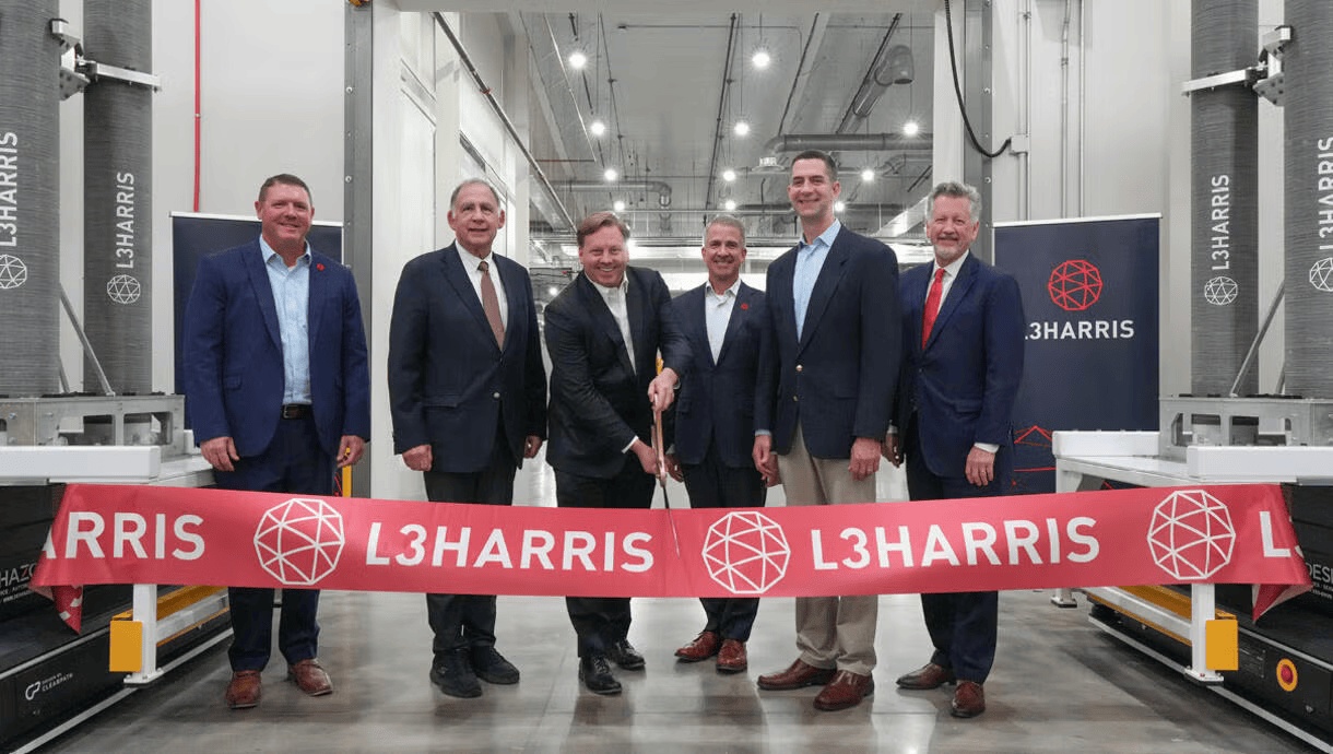 Officials and company representatives at the L3Harris facility ribbon cutting in Camden