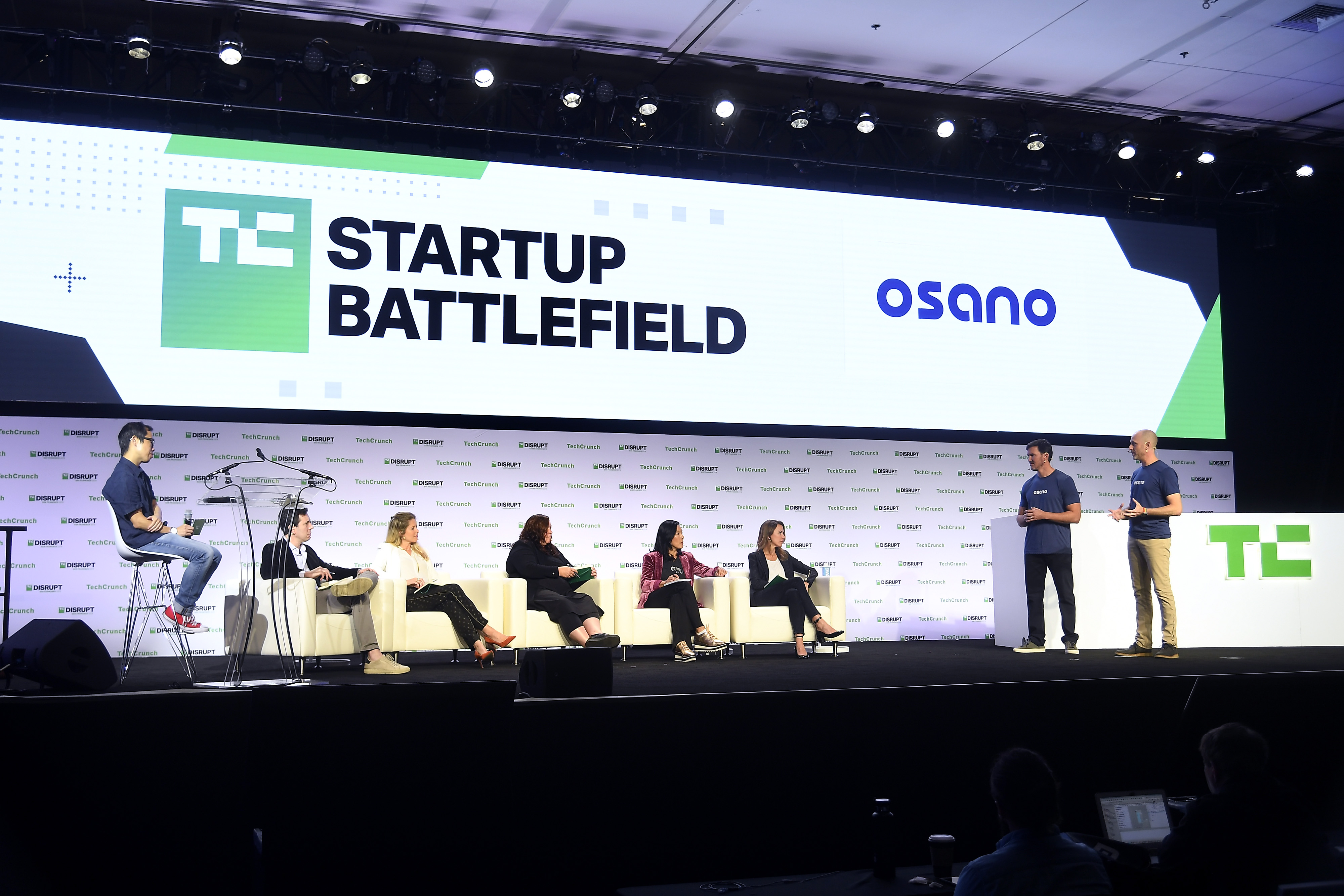 Scott Hertel and Arlo Gilbert presenting Osano onstage before the Startup Battlefield panel in San Francisco in 2019
