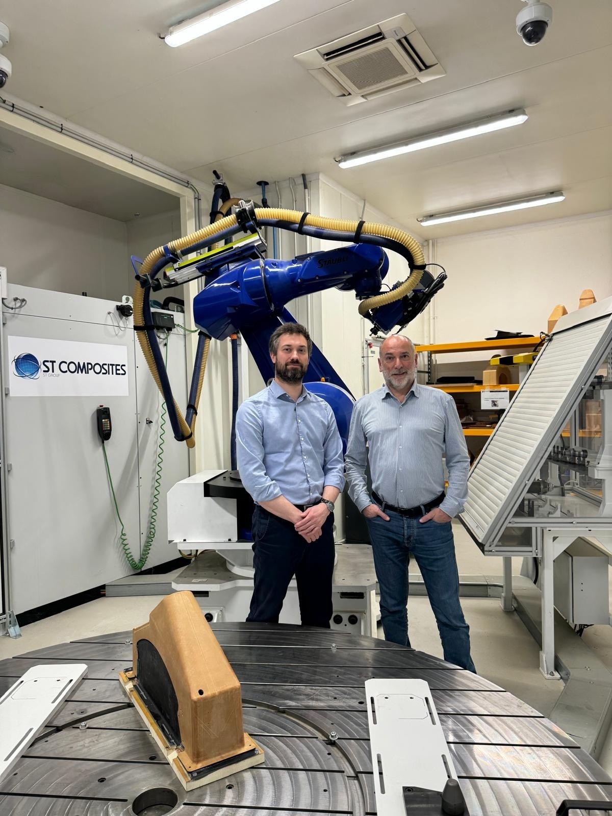 Arnaud Mournetas, left, and ST Group president Stéphane Trento beside industrial equipment at Labège