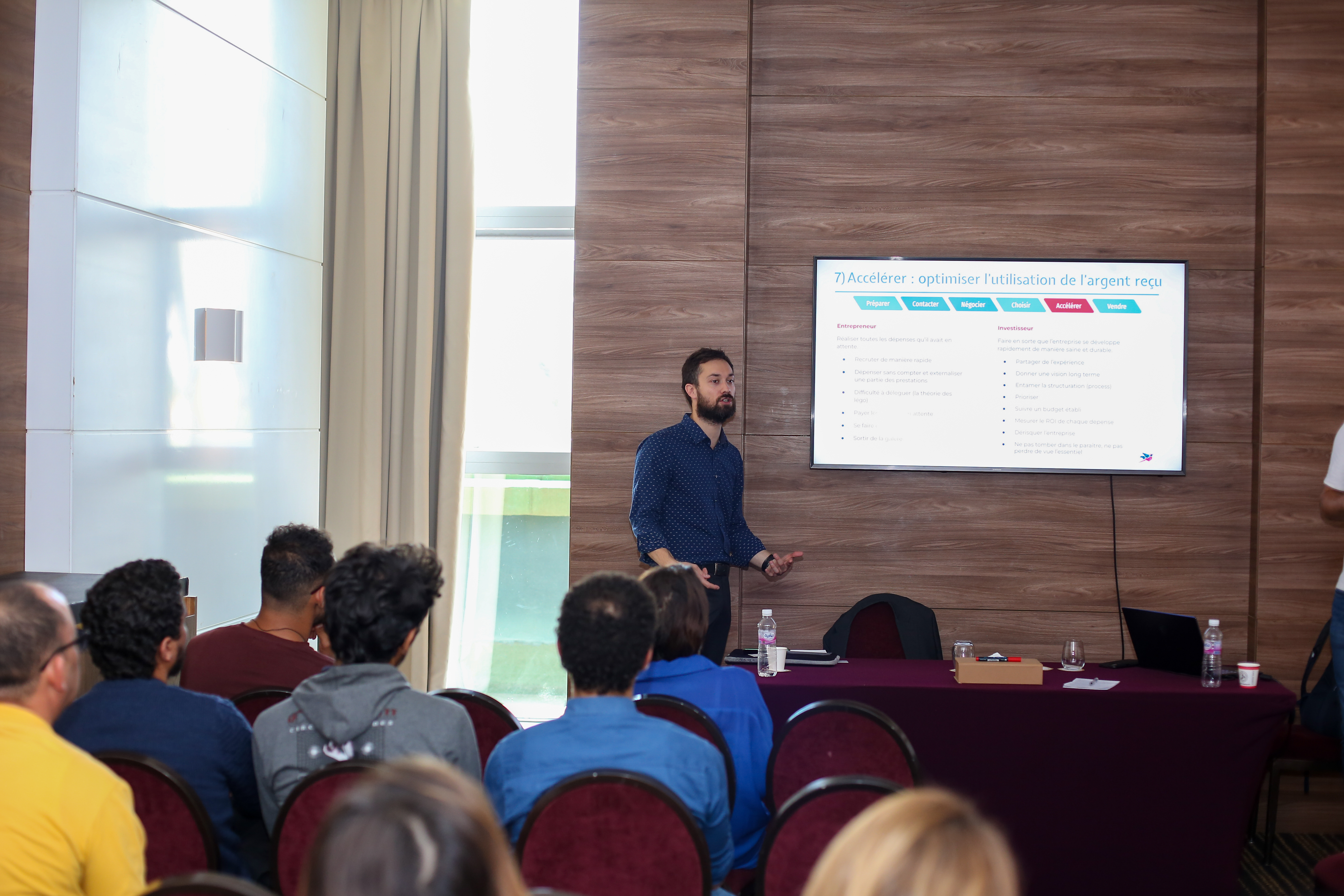 Arnaud Mournetas explaining financing and the use of investment to an audience in a workshop