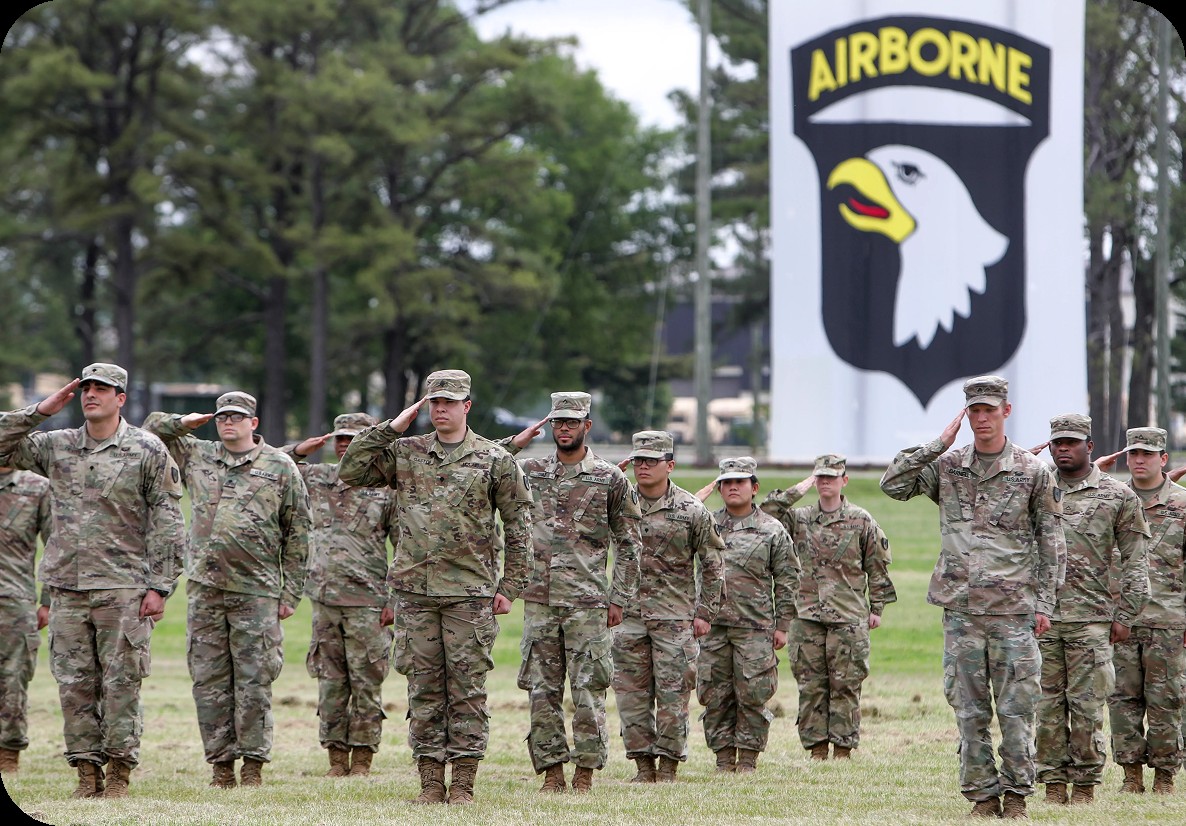 United States Army soldiers at Fort Campbell beneath the Airborne insignia