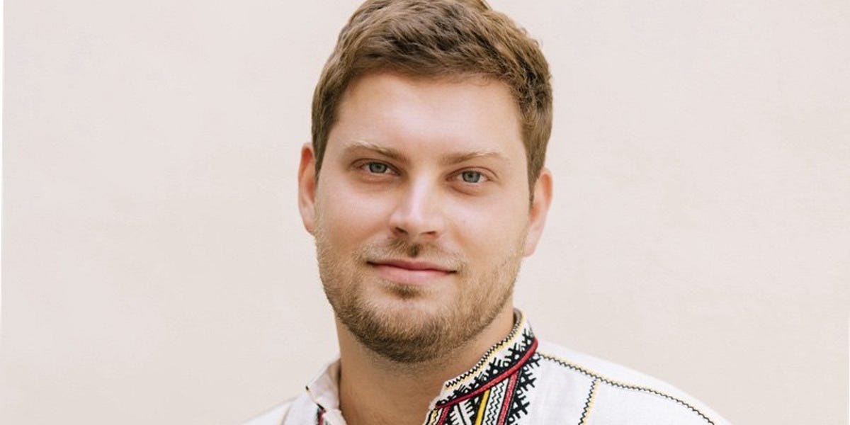 Artem Bugara wearing a traditional embroidered Ukrainian shirt
