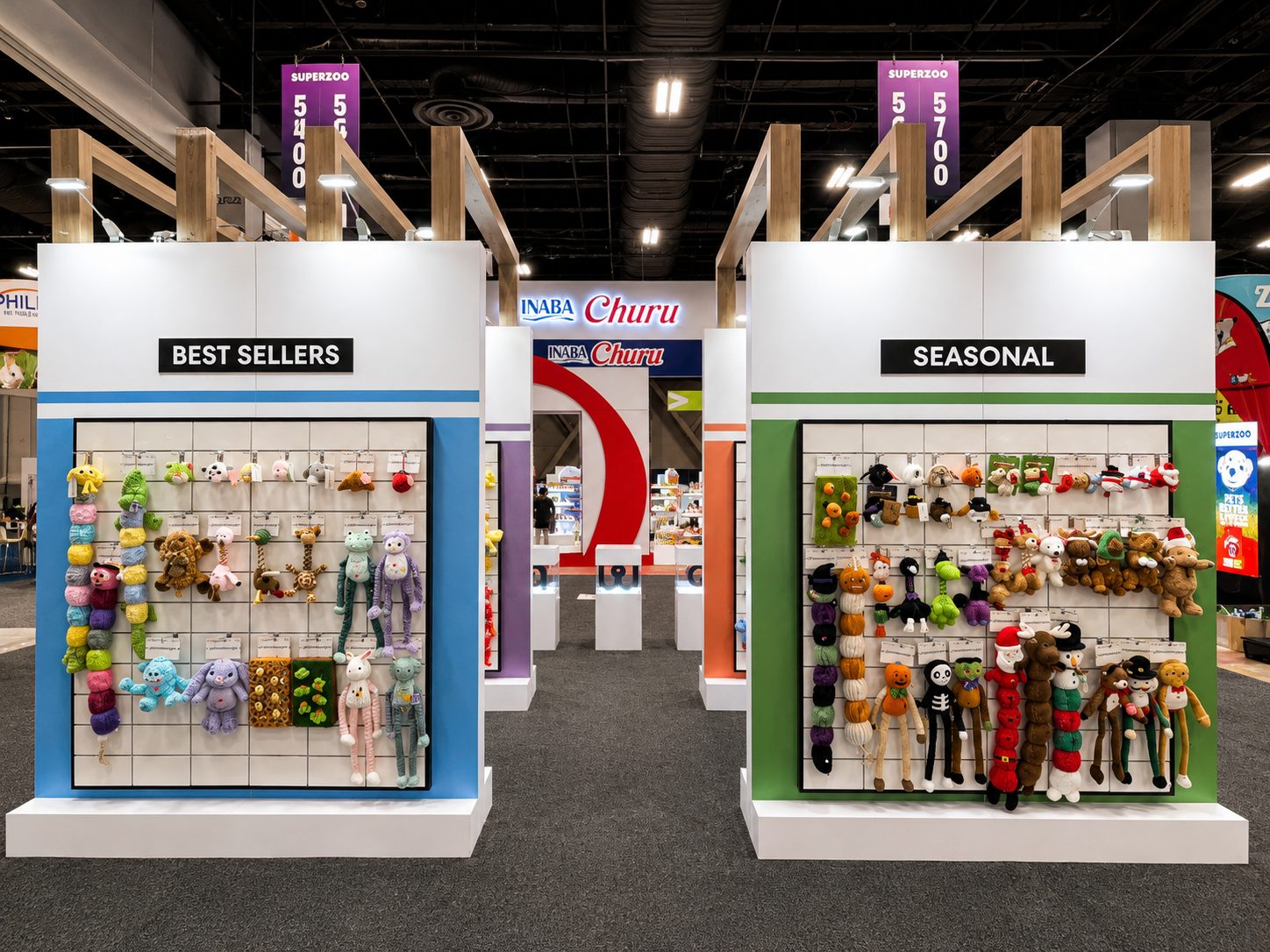 Two open product-display walls holding colorful pet toys at Patchwork’s SuperZoo exhibit