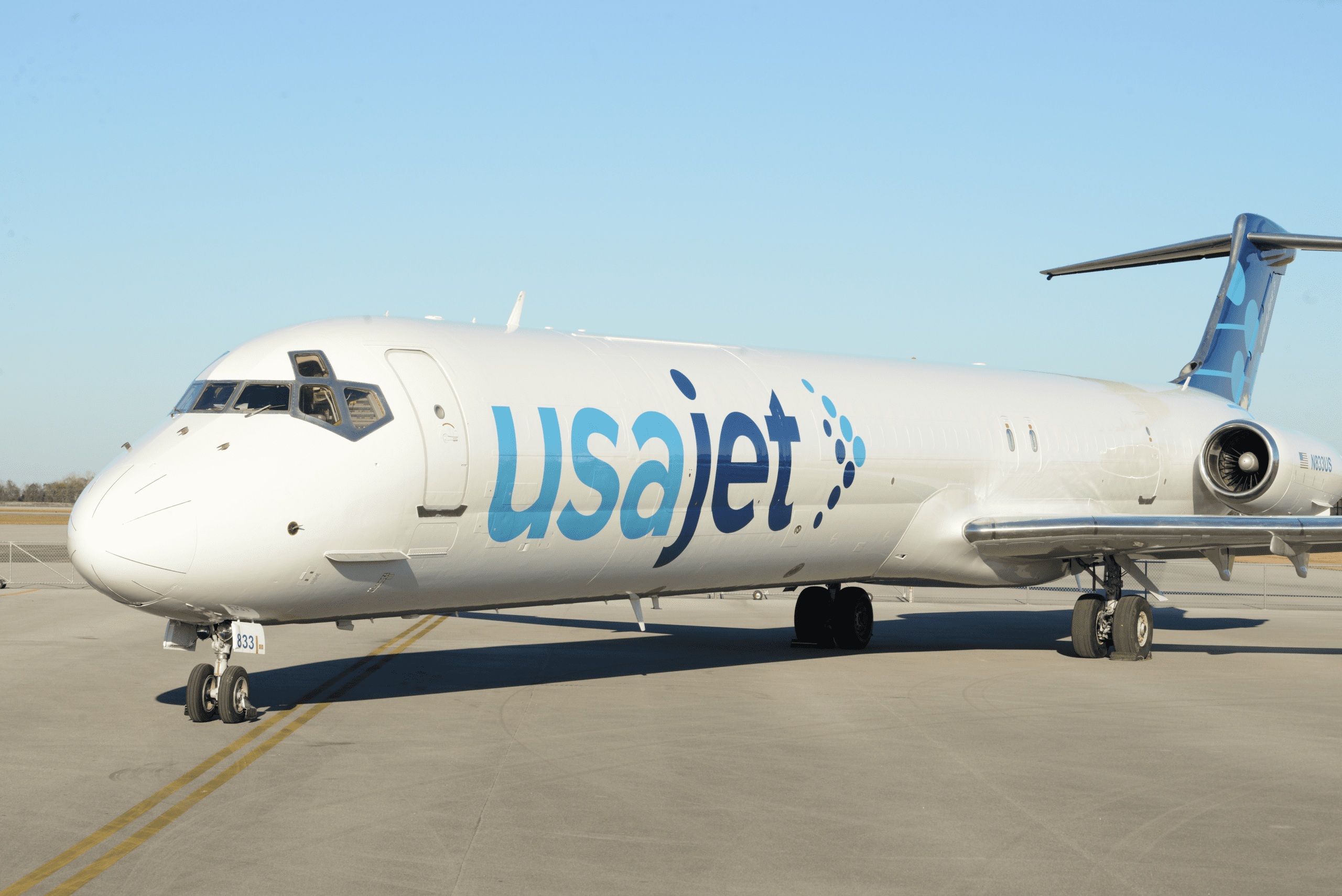 A USA Jet cargo aircraft parked on the airport apron