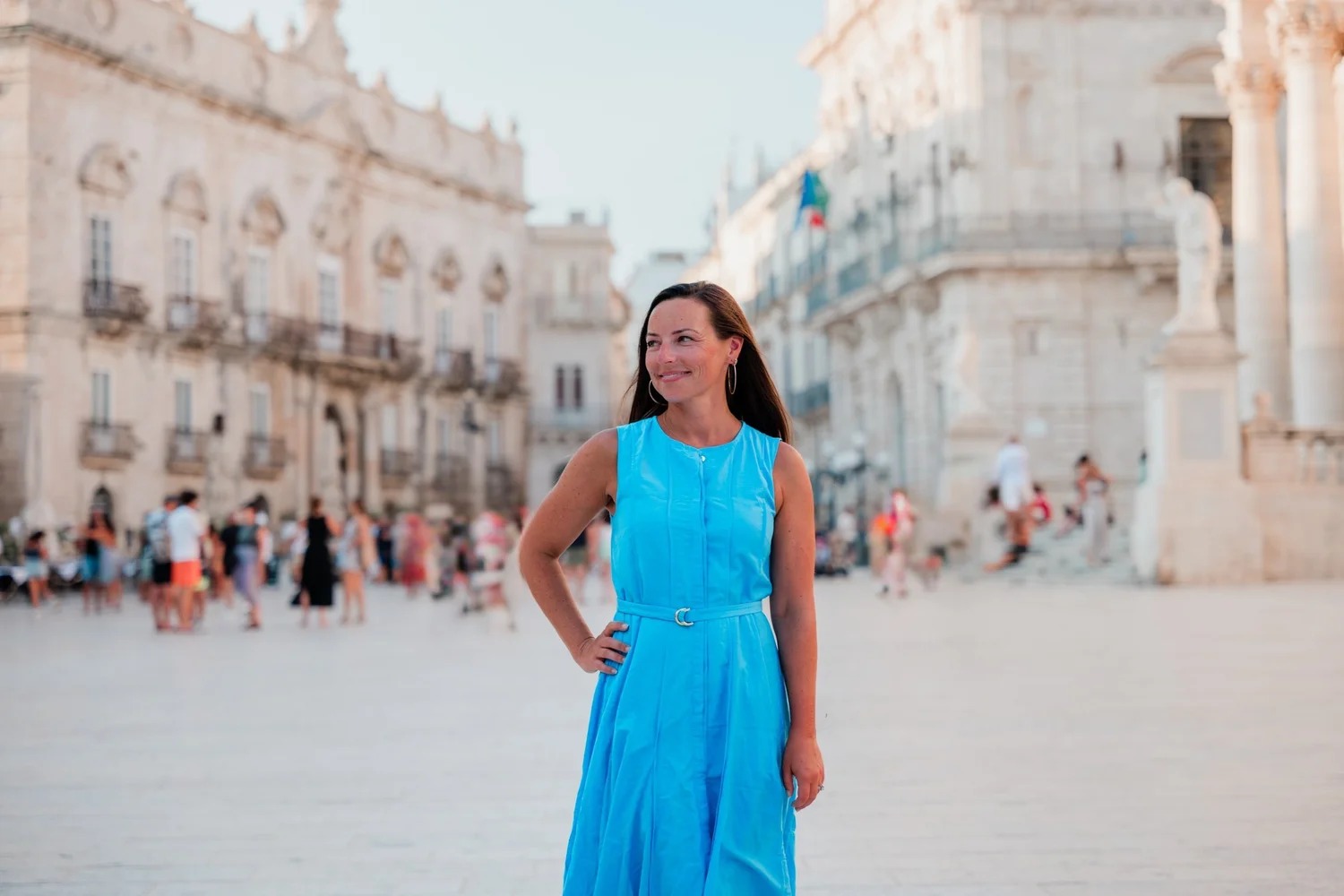 Ashley Emala standing in a historic Italian piazza