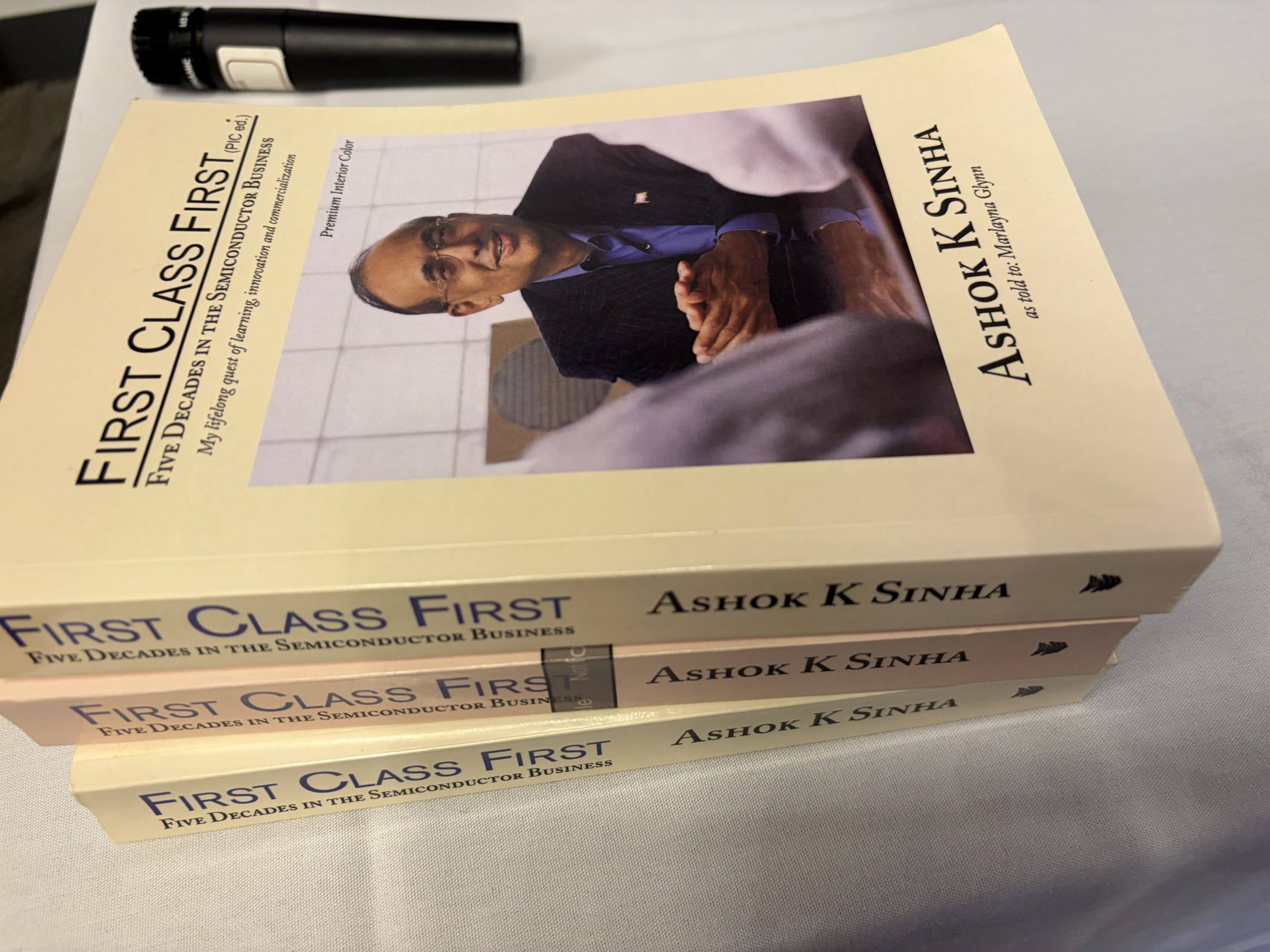 Copies of Ashok K. Sinha’s First Class First memoir on a table at the IISc alumni celebration