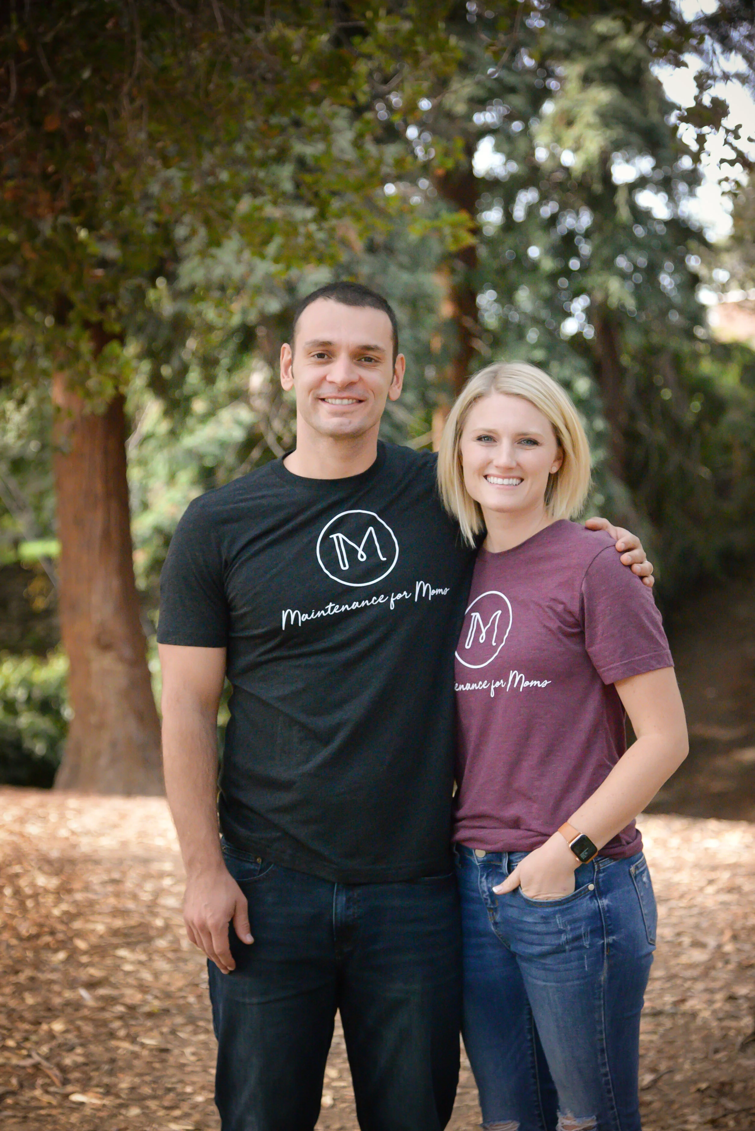 Ashot and Annie Iskandarian wearing Maintenance for Moms shirts