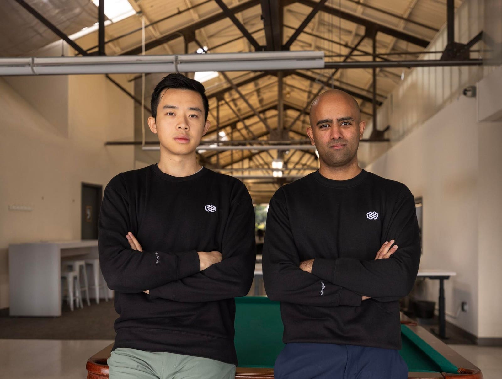 Decagon co-founders Jesse Zhang, left, and Ashwin Sreenivas, right, in their office
