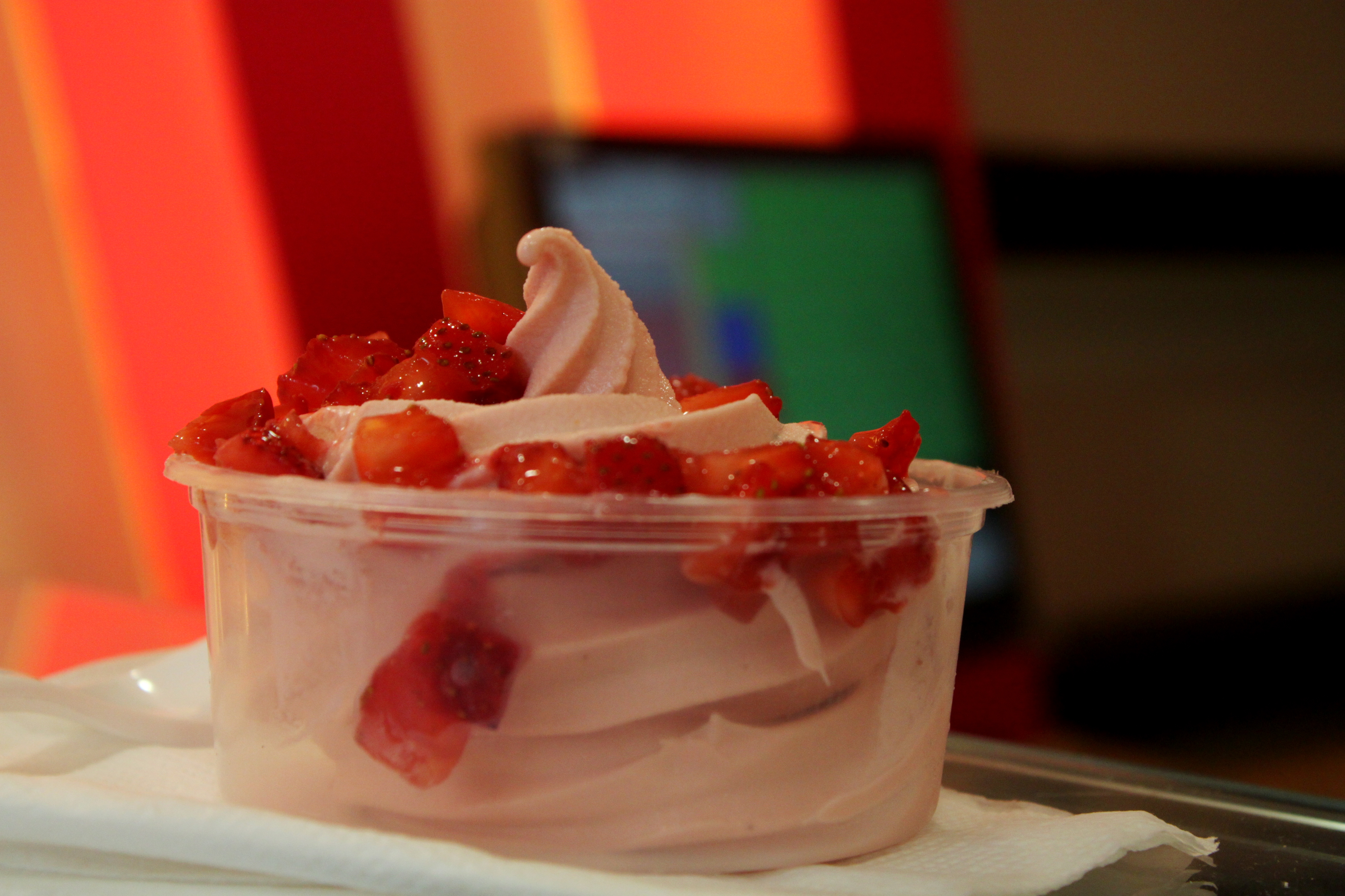 Frozen yogurt with fresh strawberry pieces, photographed for 6th Street Yogurt’s 2012 blog