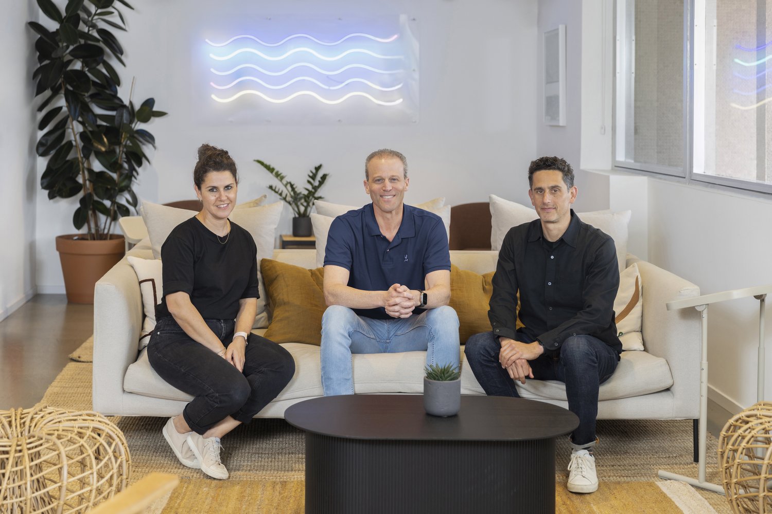 Jedify co-founders seated together in their office