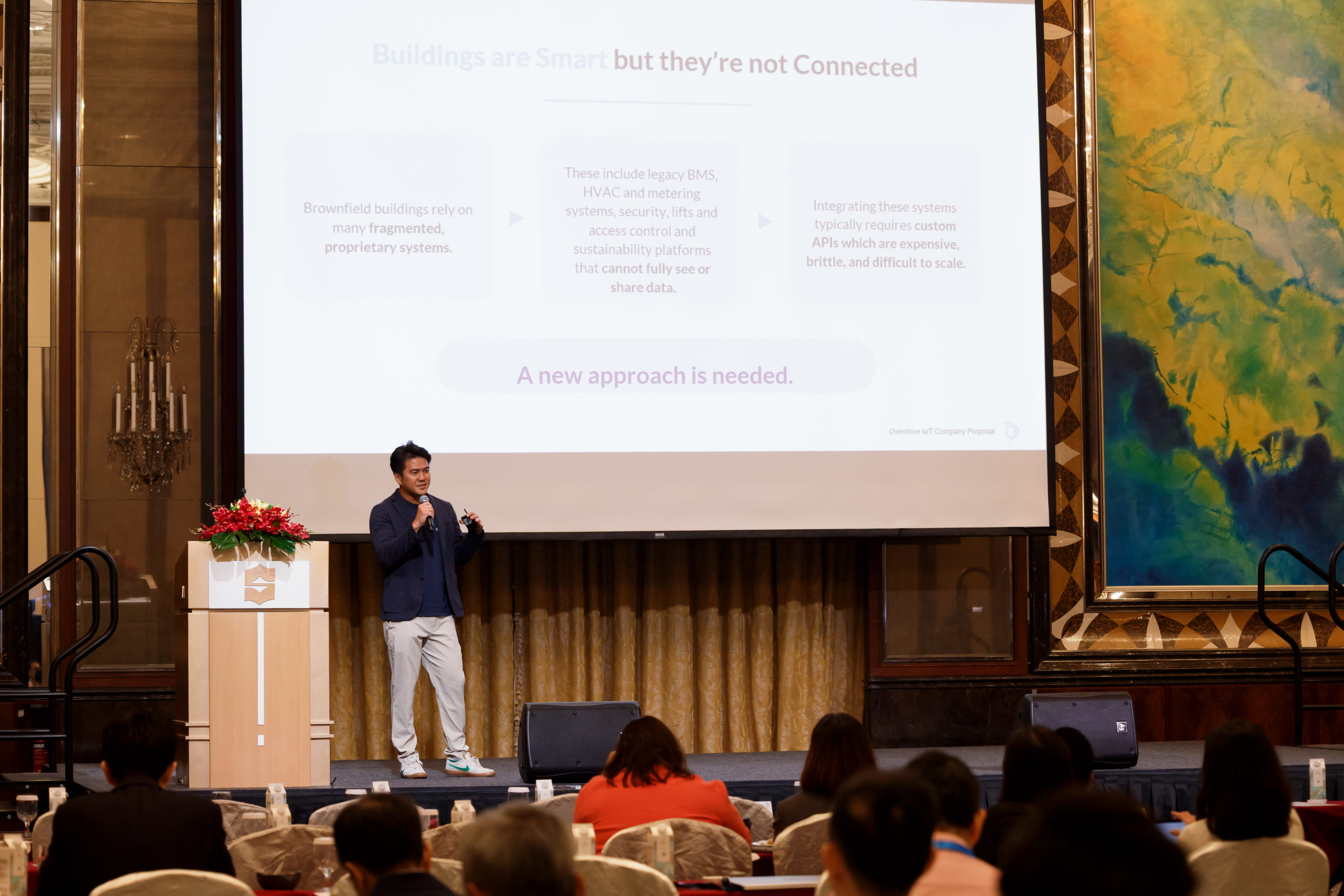 Aston Chia presenting building system integration at the Singapore-Japan Fast Track event