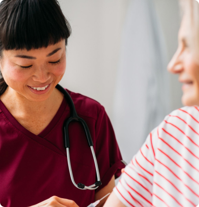 A clinician consulting with a patient in Astrana’s published provider imagery