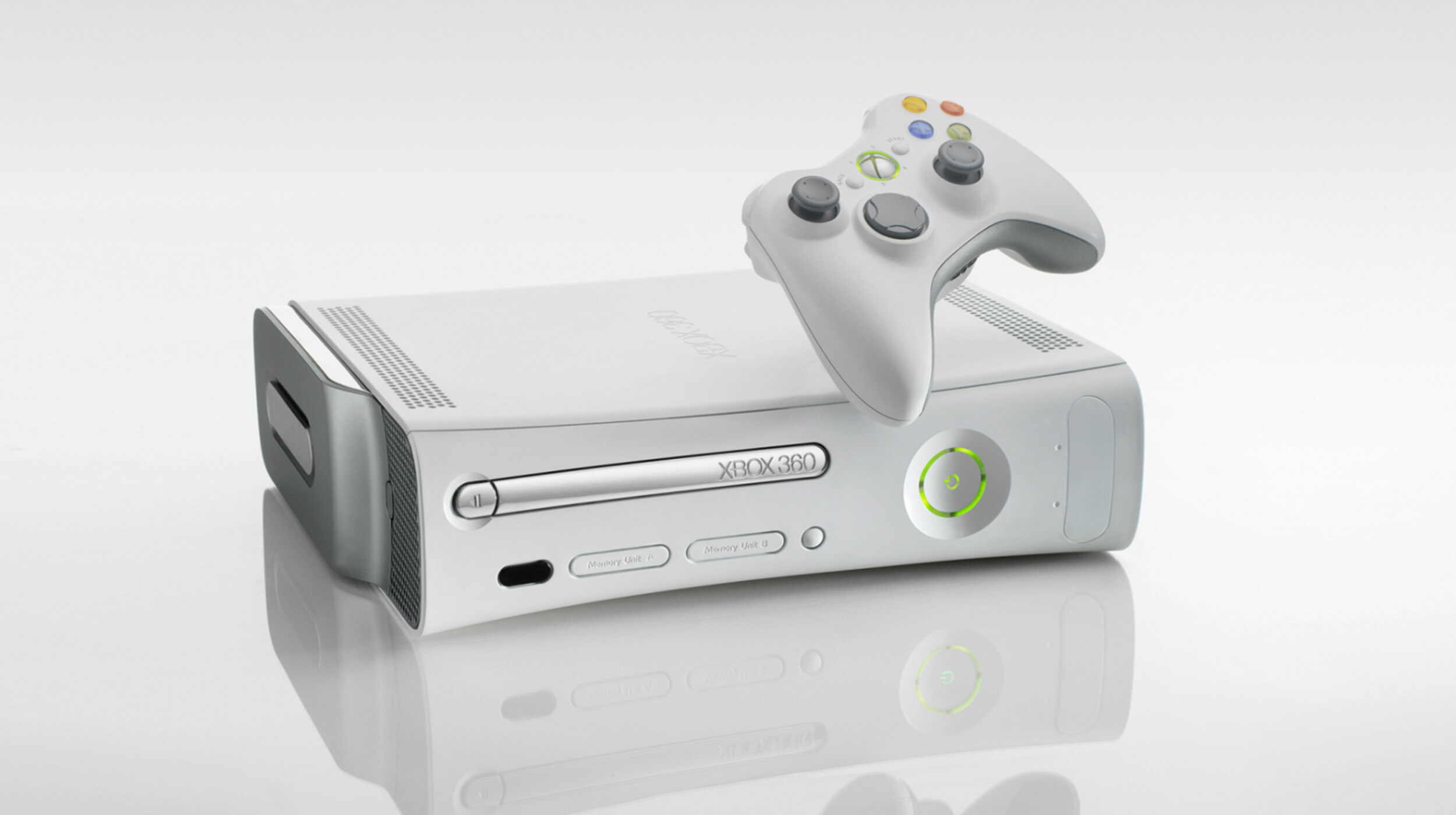White Xbox 360 console and wireless controller