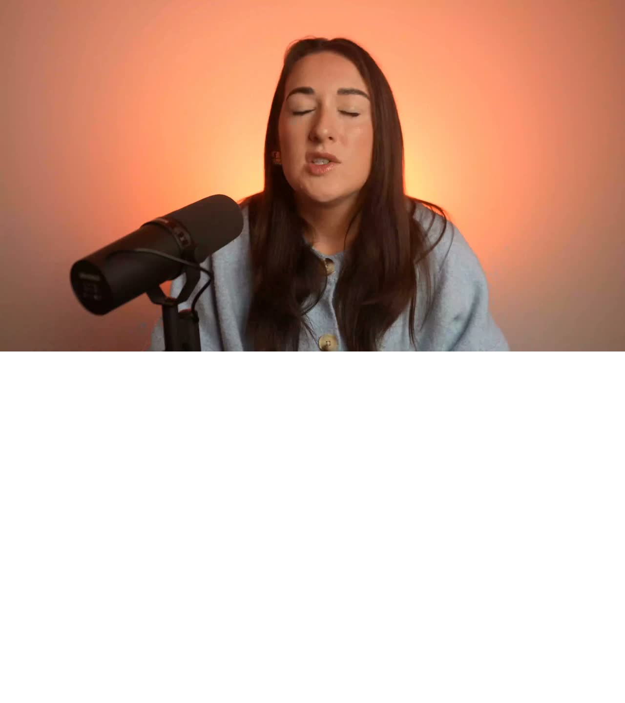 A creator recording into a studio microphone in an Async product demonstration