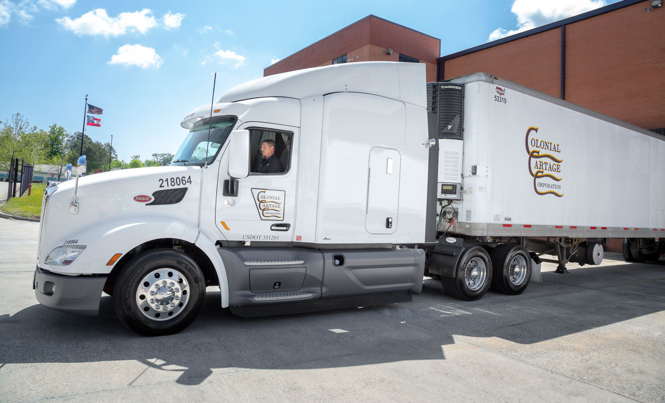 A Colonial Cartage refrigerated tractor-trailer at an ABW facility