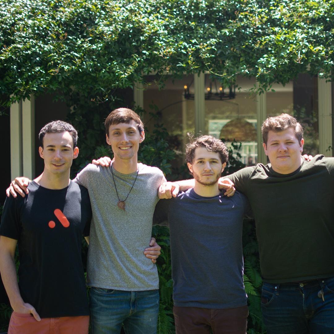 Four Atmos co-founders together outdoors