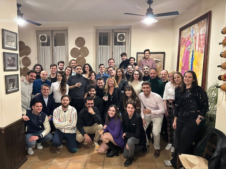 Audiense colleagues gathered for a team photograph in a restaurant