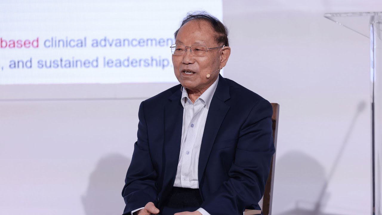 Augie Lien speaking with a headset microphone at LSI USA 2025