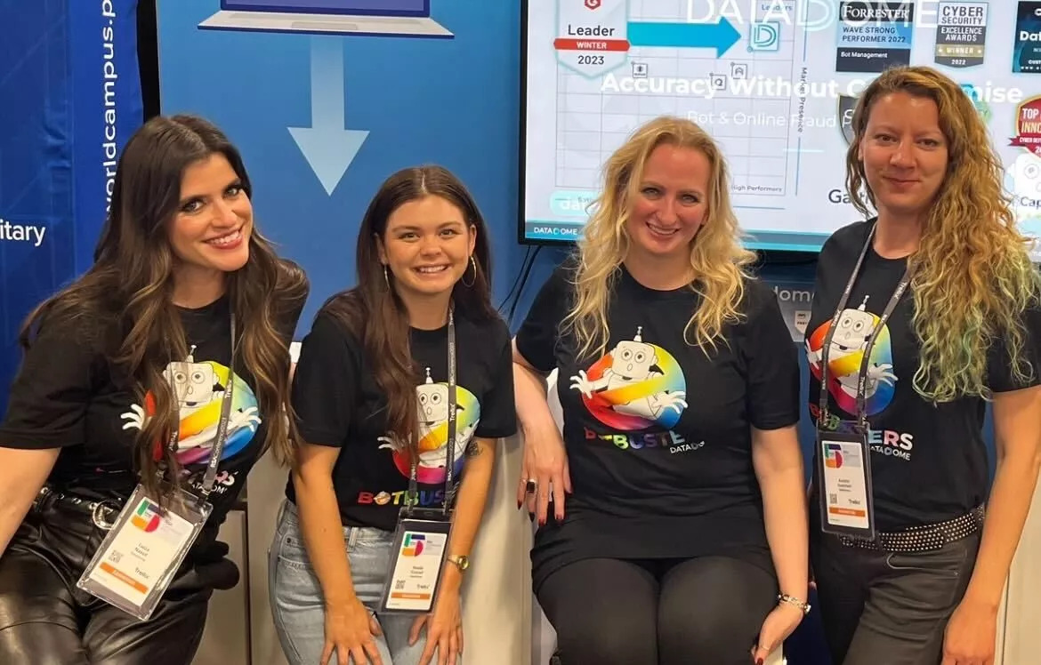 Aurelie Guerrieri, right, with three DataDome colleagues in Pride-themed BotBusters shirts at RSA Conference