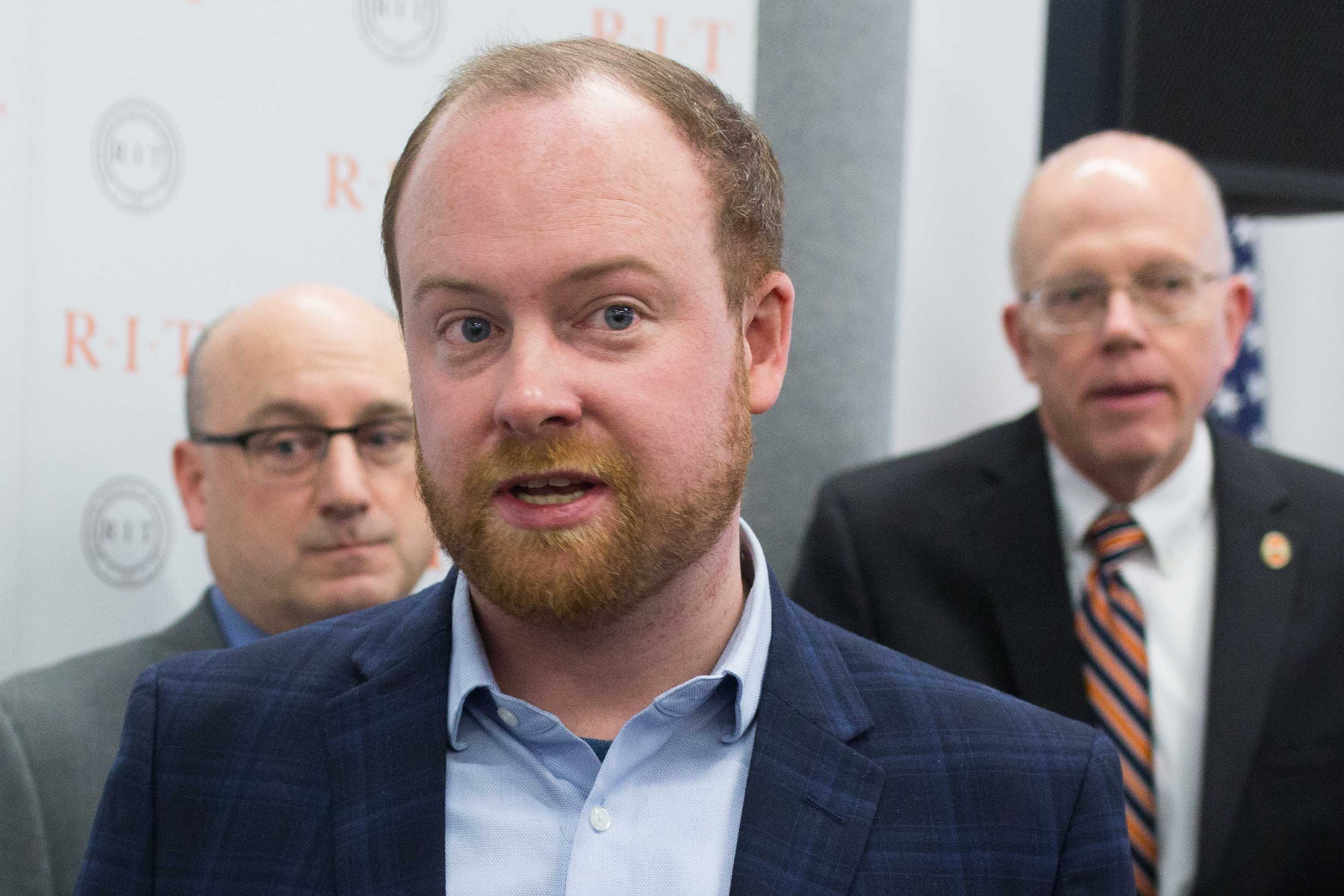 Austin McChord answering press questions at RIT after announcing his donation in December 2017