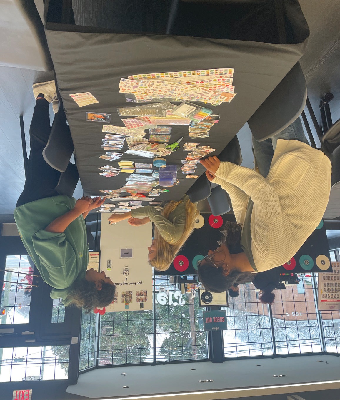 Georgia Tech students preparing handwritten notes and stickers for the Spread the Love event