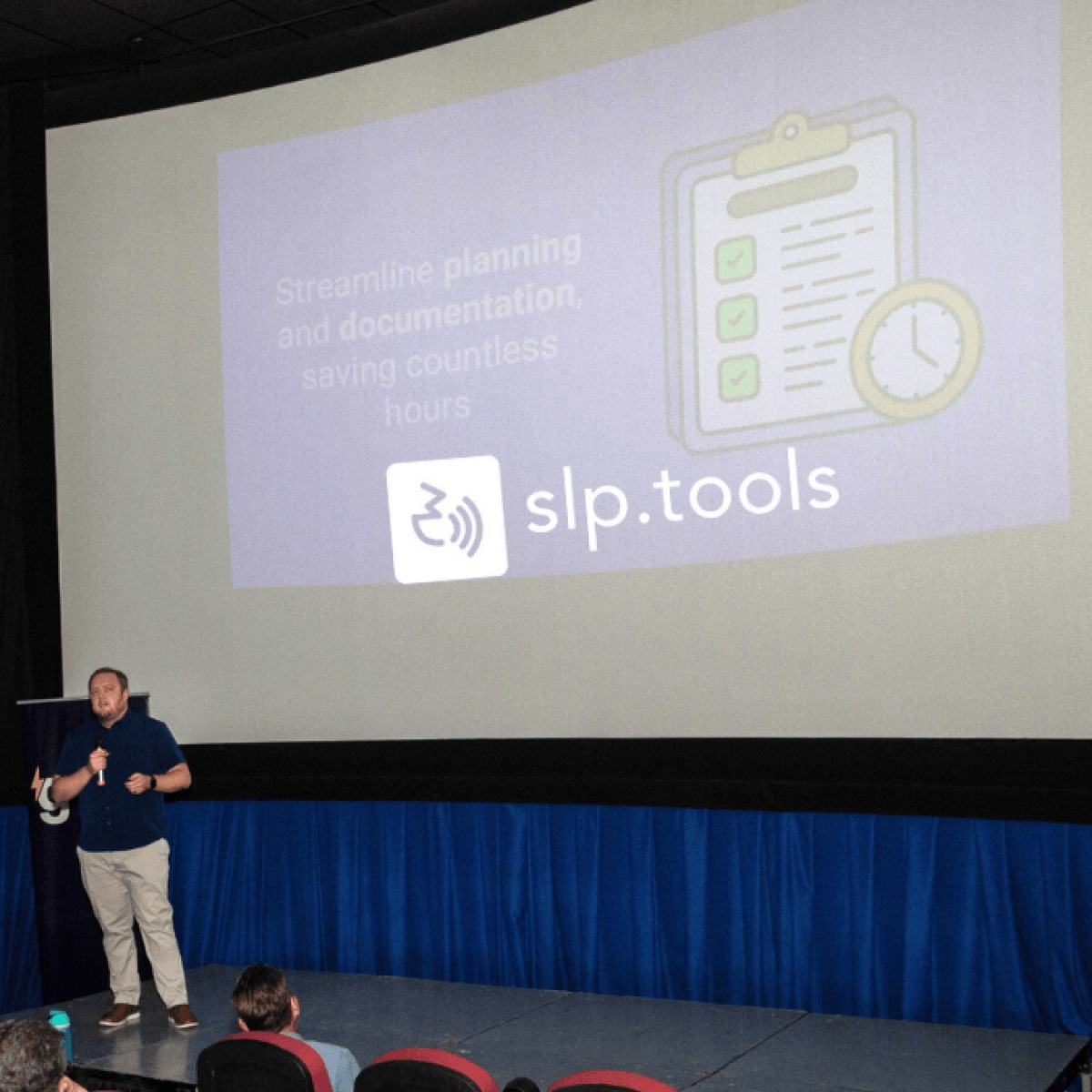 Auston Larson presenting SLP Tools onstage in Casper
