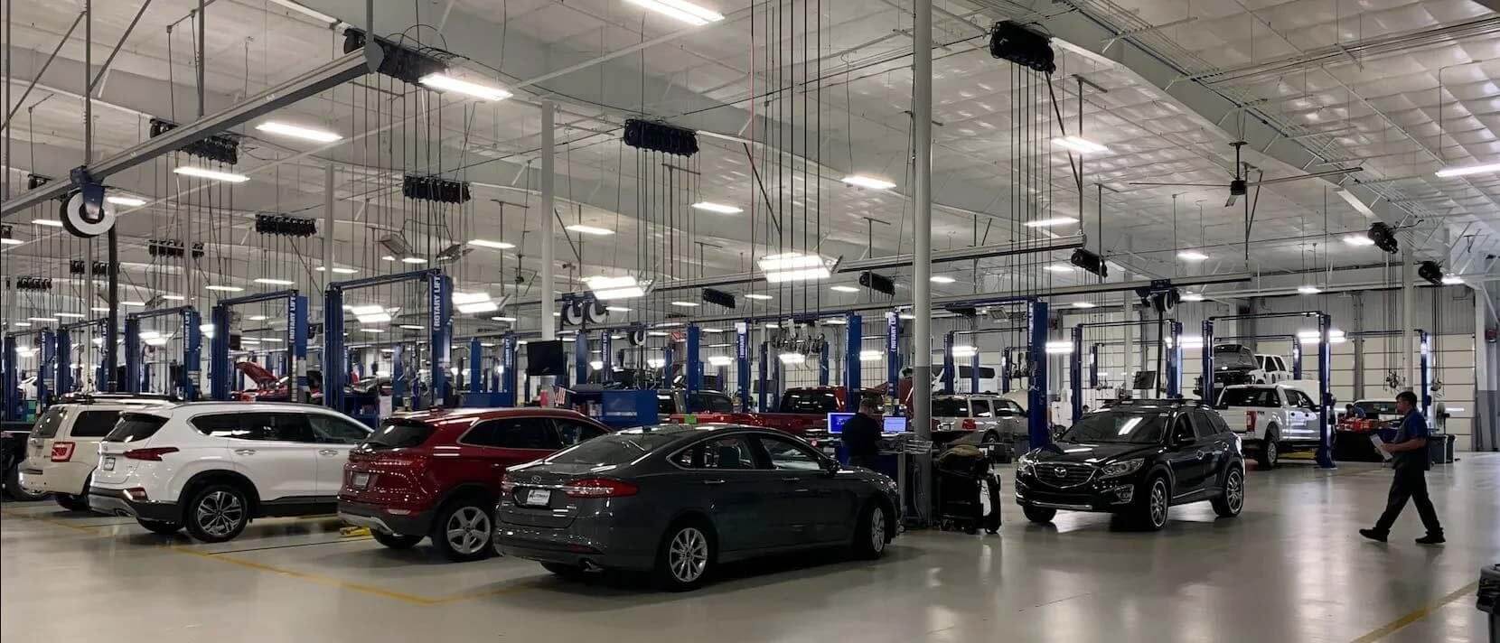 Vehicles and equipment inside the ServiceMax repair facility