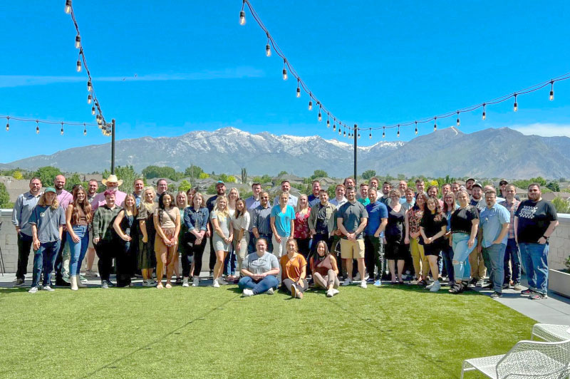 The Avalaunch Media team gathered outdoors in Lehi, Utah
