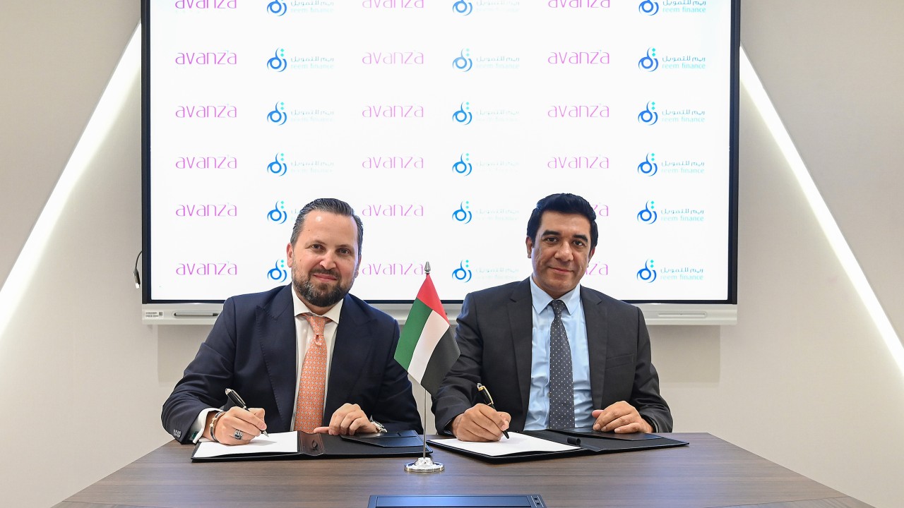 Reem Finance and Avanza representatives signing their partnership agreement in Abu Dhabi