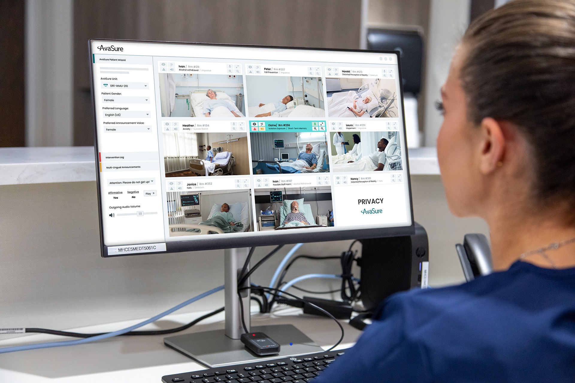 AvaSure promotional photograph showing an observer viewing several patient rooms on a monitoring interface