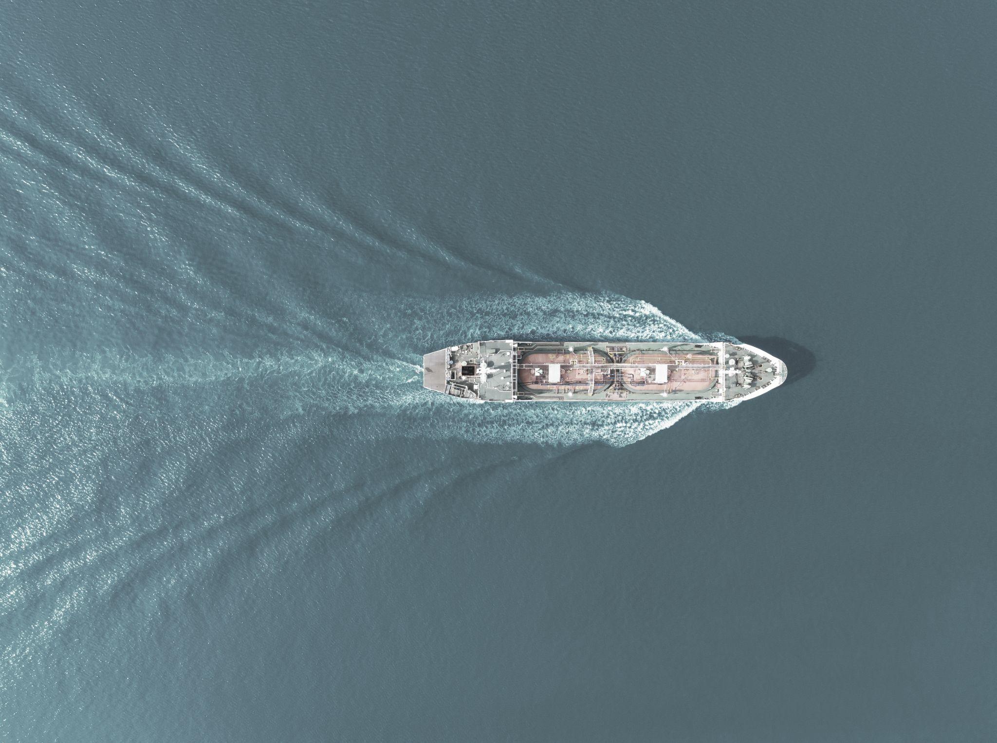 Aerial view of a large vessel under way at sea