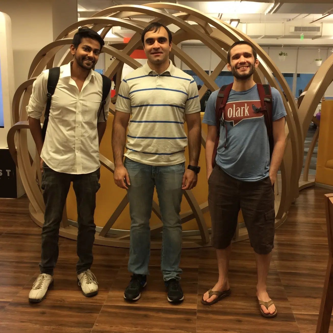 Avi Patchava, center, with two interview visitors at InMobi's Bengaluru headquarters