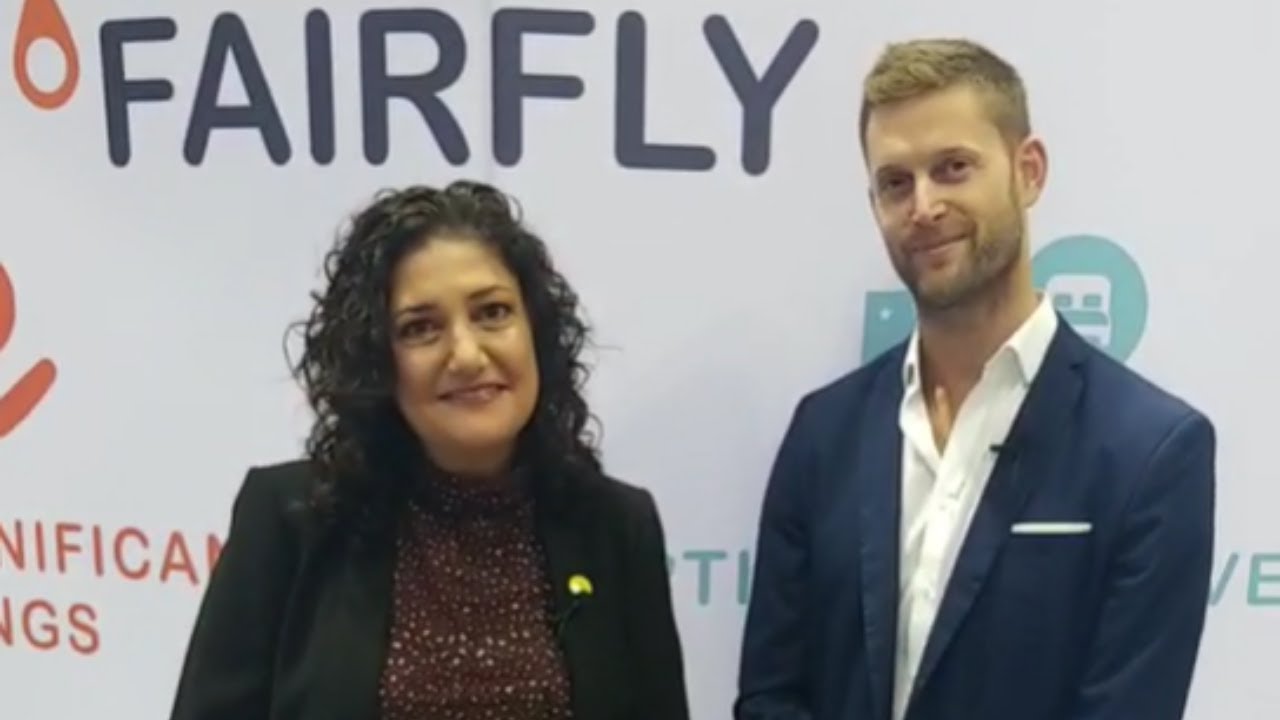 Miriam Moscovici and Aviel Siman-Tov at the FairFly booth during a 2021 BCD Travel interview