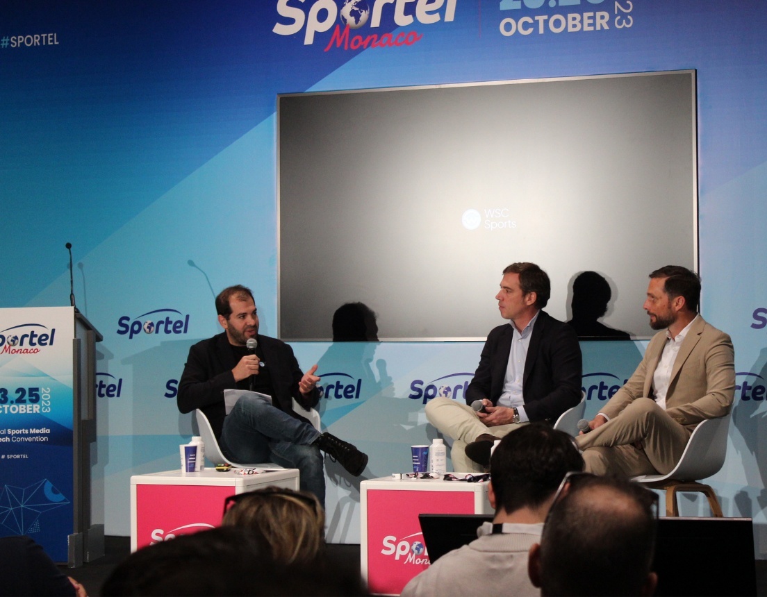 Aviv Arnon, seated at left with a microphone, speaks with NBA and LALIGA executives at SPORTEL Monaco in 2023