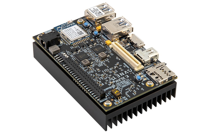 Angled view of an Avnet Ultra96-V2 development board on a black heatsink