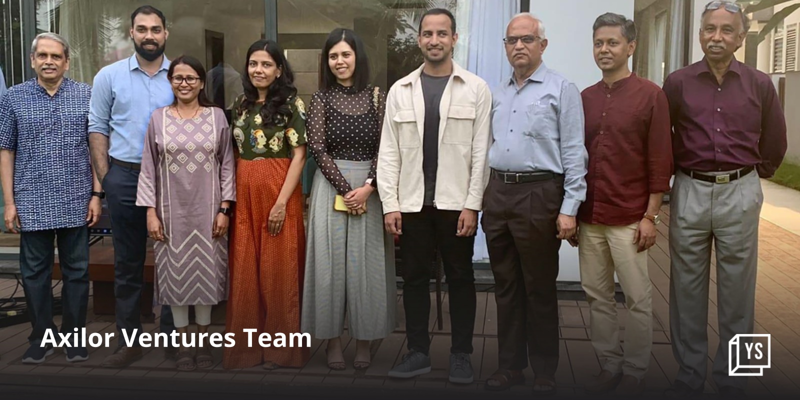 Eight Axilor Ventures team members standing outdoors in the photograph published with the 2022 fund announcement